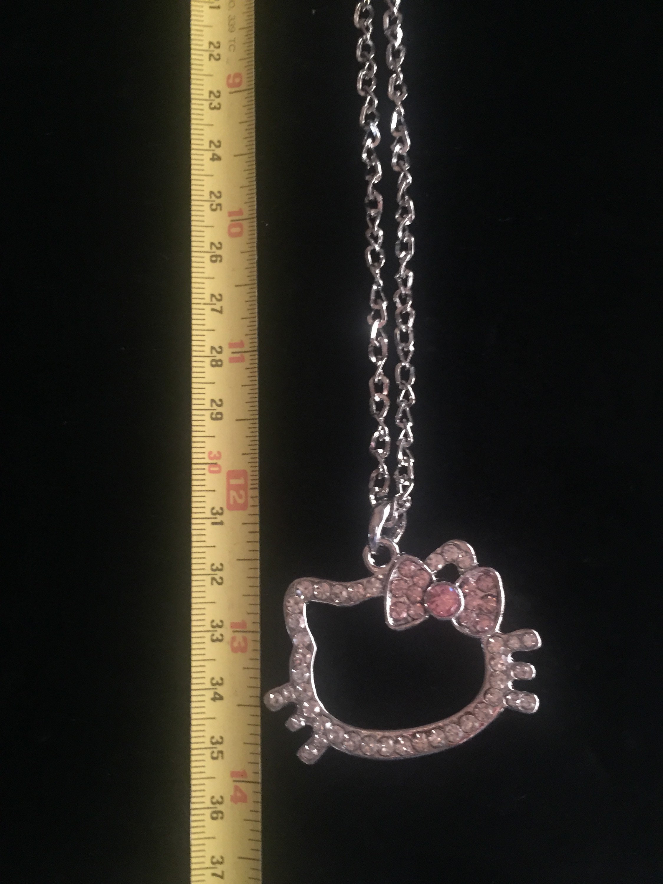 Amazon.com: Hello Kitty Beaded Ribbon Necklace with charm
