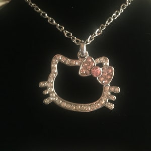 Hello Kitty Face Necklace Pendant Charm With a Pink Bow Paved Cubic ...