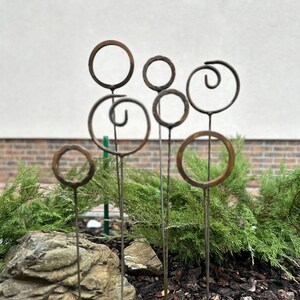 Set of 7 Rusty Metal Garden Stakes – Weathered Finials for Outdoor Decor and Handcrafted Metal Yard Accents