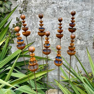 Set of 9 Rusty Garden Pegs with Tiny Flowers, Rustic Yard Art, Metal Garden Decor, Outdoor Rusty Stakes, Weathered Garden Accents