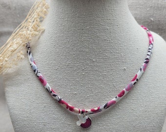 Religious necklace in pink liberty with a mother-of-pearl cross and a colored virgin medal