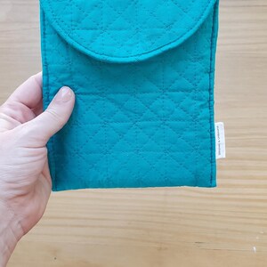 May include: A white ceramic mug with a black handle and the text "But First, Coffee" in a black, handwritten-style font. The mug is likely 11-15 ounces in size, perfect for a morning beverage.