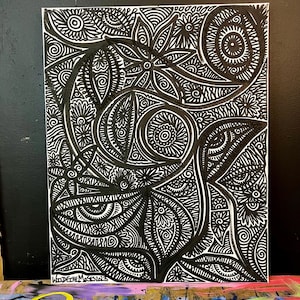 May include: Black and white abstract art painting with intricate patterns and designs. The painting features a variety of shapes, including circles, ovals, and swirls. The artist's signature, "Woodere Muse 5/2023", is visible in the bottom right corner.