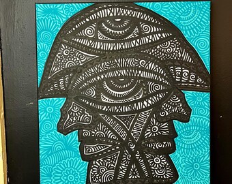 May include: Black and white abstract art painting on a turquoise background. The painting features a stylized face with multiple eyes and intricate patterns.