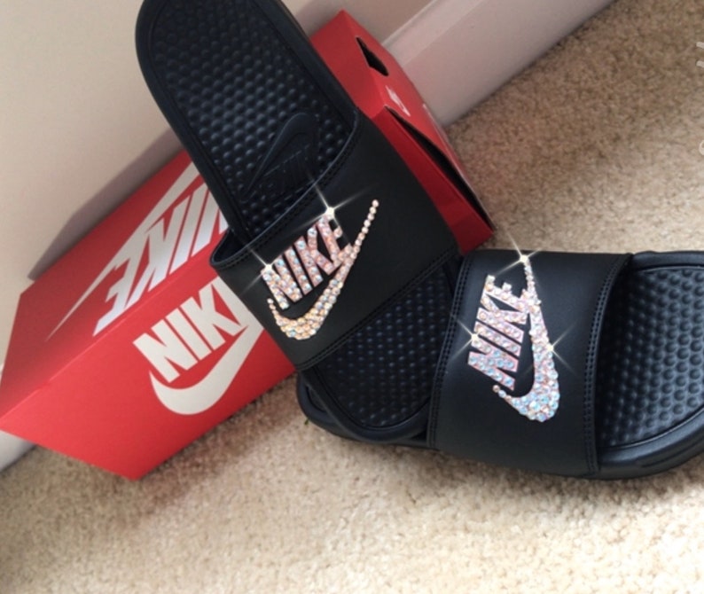 womens black and gold nike slides