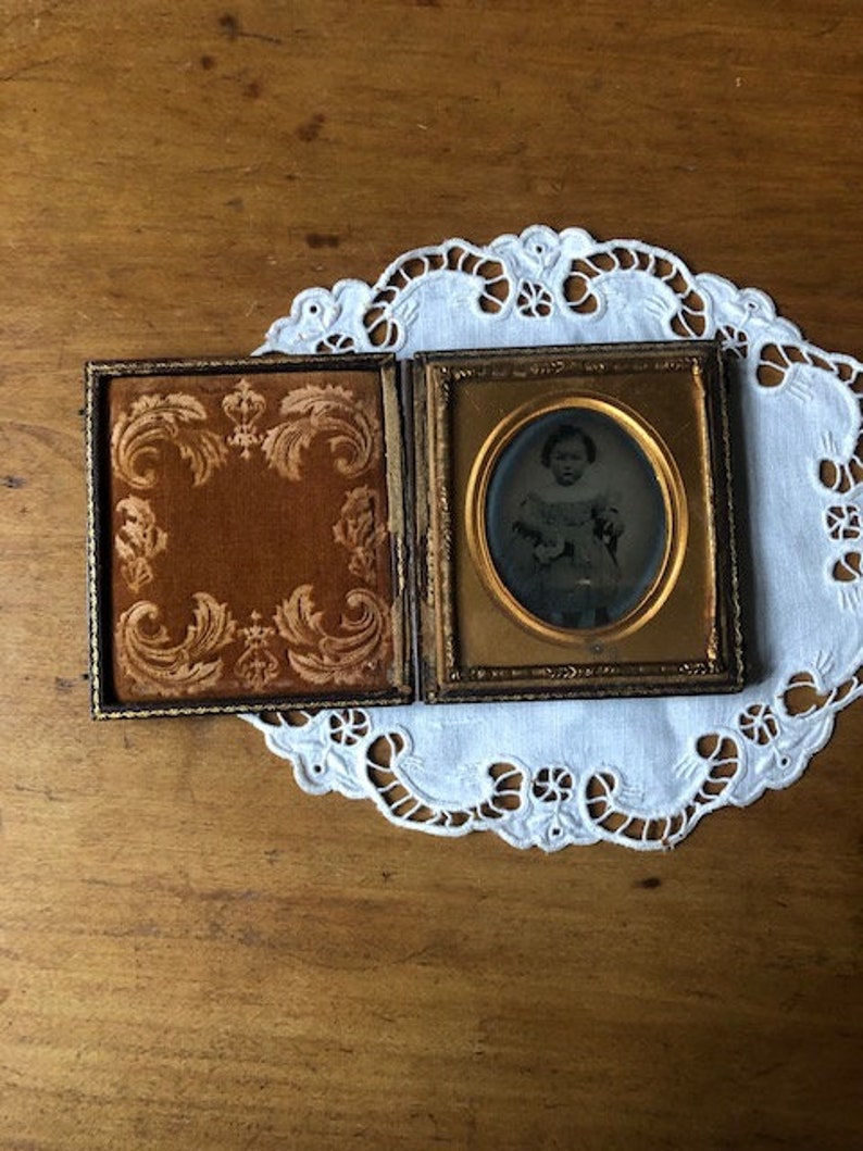 Antique Photograph Daguerreotype of Little Girl with Pouting Face in Embossed Leather Case with Velvet and Gold