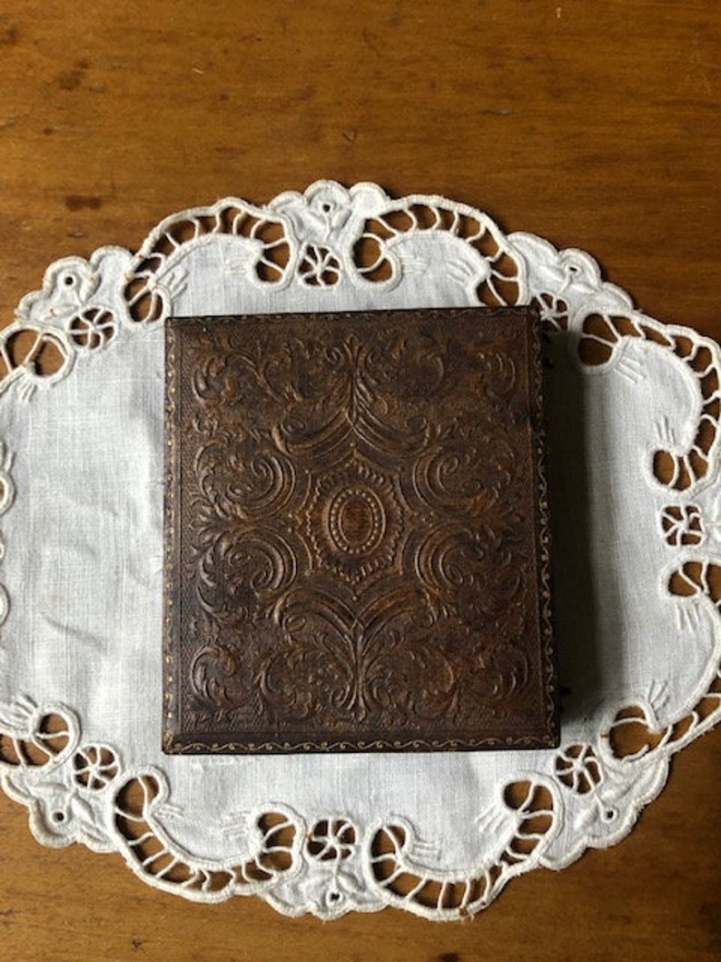 Antique Photograph Daguerreotype of Little Girl with Pouting Face in Embossed Leather Case with Velvet and Gold