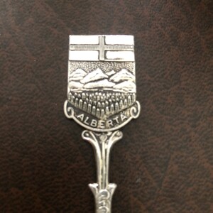 Vintage Souvenir Spoon from Alberta, Calgary, Canada.  Silver Plate Marked 90 Made in Holland