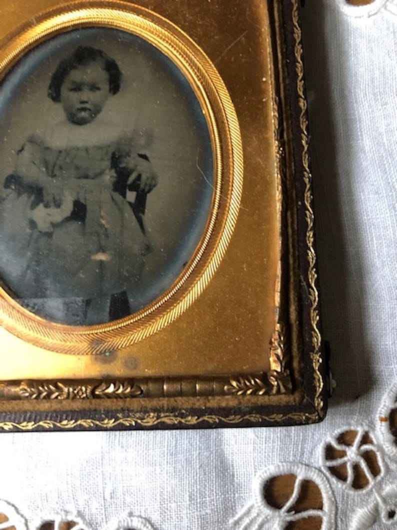 Antique Photograph Daguerreotype of Little Girl with Pouting Face in Embossed Leather Case with Velvet and Gold