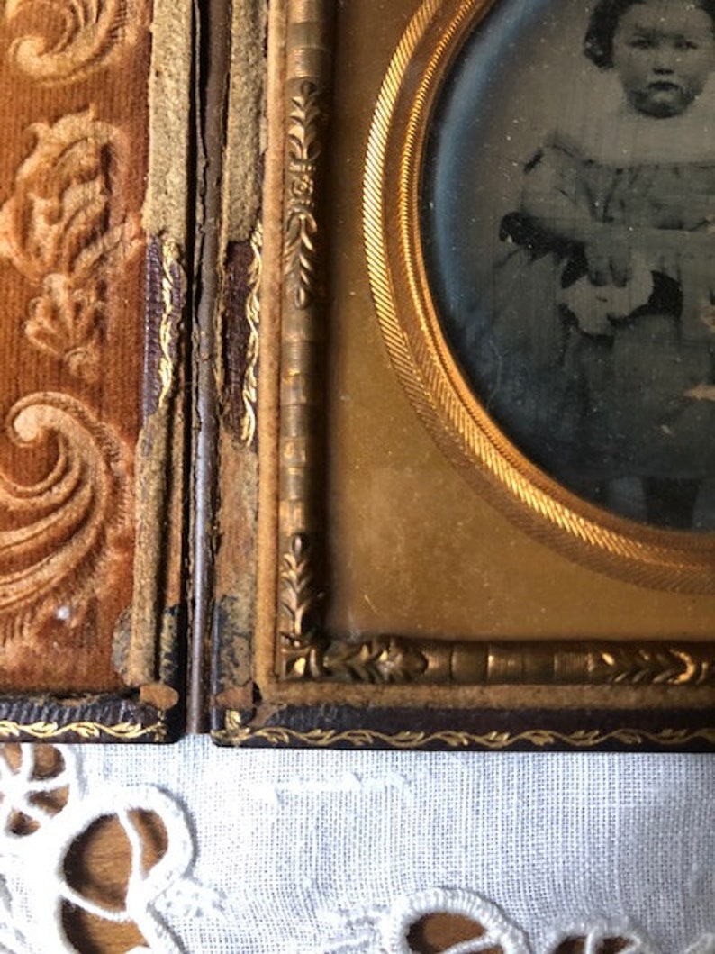Antique Photograph Daguerreotype of Little Girl with Pouting Face in Embossed Leather Case with Velvet and Gold