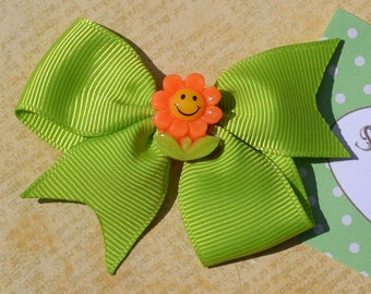Green Hair Bow | 2-Loop Bright Apple Green Grosgrain Hair Bow | Cute Smiling Orange Flower Center | Babies to Big Girls