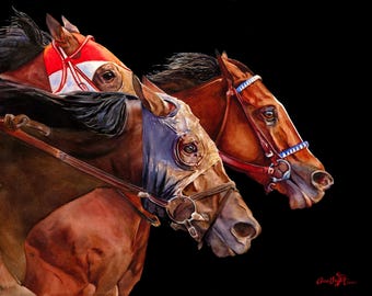 May include: Three brown horses with colorful racing headgear are running side by side, their heads turned to the side, against a black background.