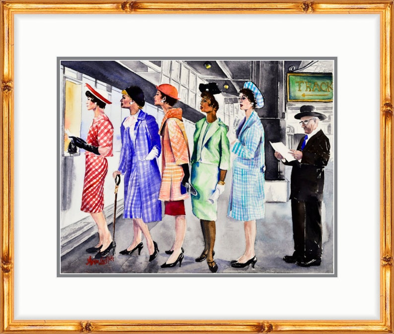 May include: Five women in colorful dresses and hats stand in line at a train station. A man in a suit and hat reads a paper nearby. The sign above reads "Track".