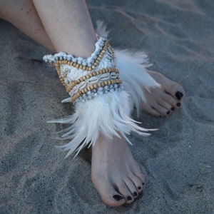 Handmade ankle feather cuffs, real seashells and gorgeous beading. Perfect for any occasions!