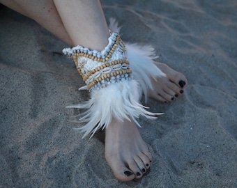 Handmade ankle feather cuffs, real seashells and gorgeous beading. Perfect for any occasions!