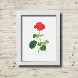 Puede incluir: Un patrón de punto de cruz de una sola flor de geranio roja con hojas verdes sobre un fondo blanco.