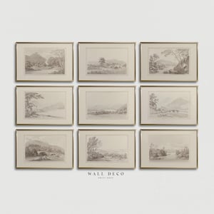 May include: Nine framed landscape prints with gold-coloured frames. Each print features a sepia-toned illustration of a natural scene, including mountains, trees, and bodies of water. The prints are arranged in a three-by-three grid.