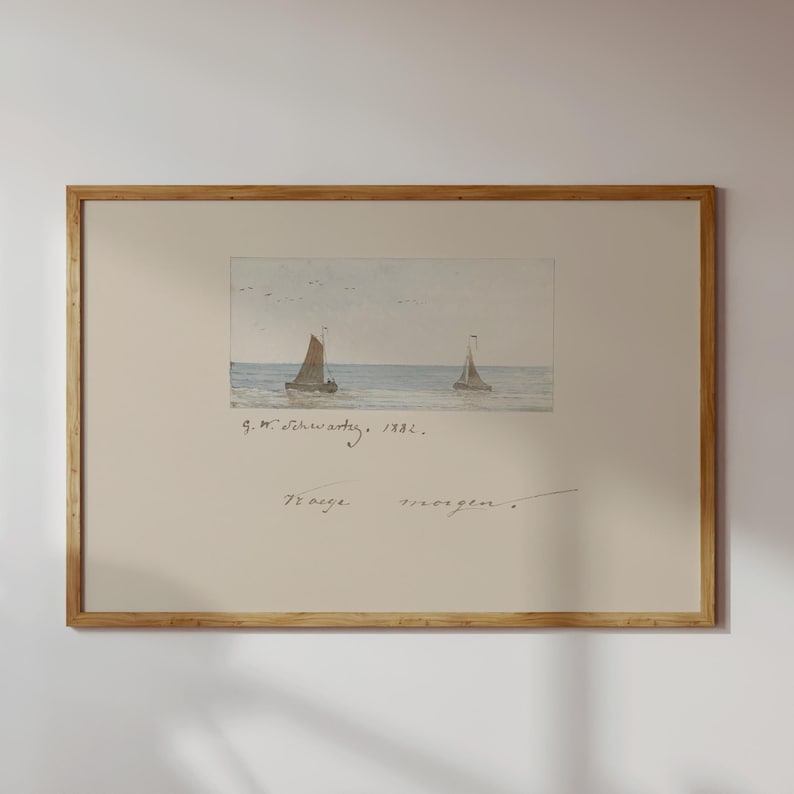 Puede incluir: Una pintura de acuarela enmarcada de dos veleros en el oc&eacute;ano. La pintura est&aacute; firmada y fechada en 1882. El marco es de madera clara. La pintura tiene un tema n&aacute;utico sereno.