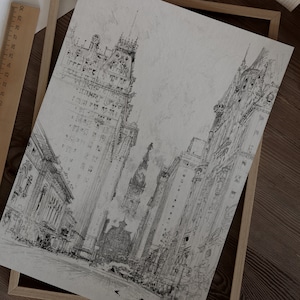 May include: A black and white pencil drawing of a city street with tall buildings. The buildings are drawn in a detailed and realistic style, with intricate details on the facades. The street is lined with trees and lampposts, and there are people walking on the sidewalk.