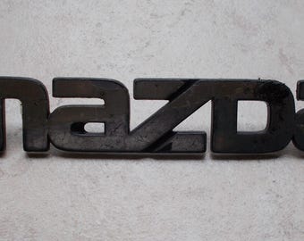 Insignia con emblema de MAZDA antiguo, placa de mascota, insignia de coche, auto vintage de los años 90