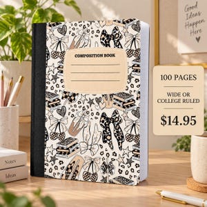 May include: A composition book with a black spine and a cream-colored cover featuring a repeating pattern of leopard print bows, stacks of books, hearts, and stars. A central label reads COMPOSITION BOOK with four blank lines for writing text.