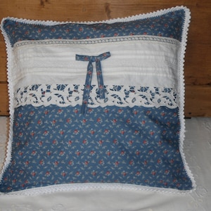 Romantic cushion in old linen and liberty fabric with small roses