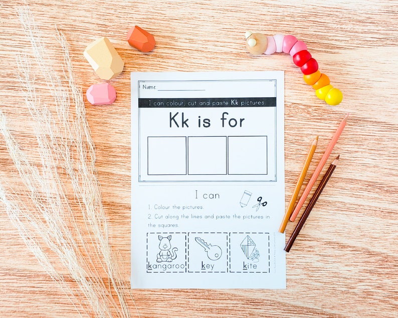 May include: A printable worksheet for kids to learn the letter K. The worksheet has a title that says "Kk is for" and has three blank boxes for kids to draw or paste pictures of things that start with the letter K. The worksheet also has three pictures of a kangaroo, a key, and a kite that kids can color, cut out, and paste into the boxes.
