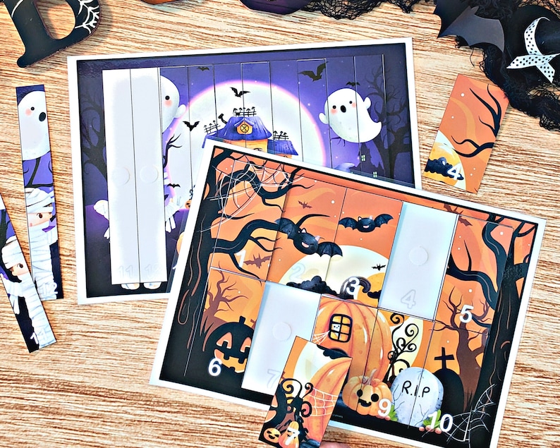May include: A Halloween-themed puzzle with 10 pieces. The puzzle features a spooky scene with a pumpkin, a graveyard, bats, and a moon. The pieces are numbered 1 through 10.
