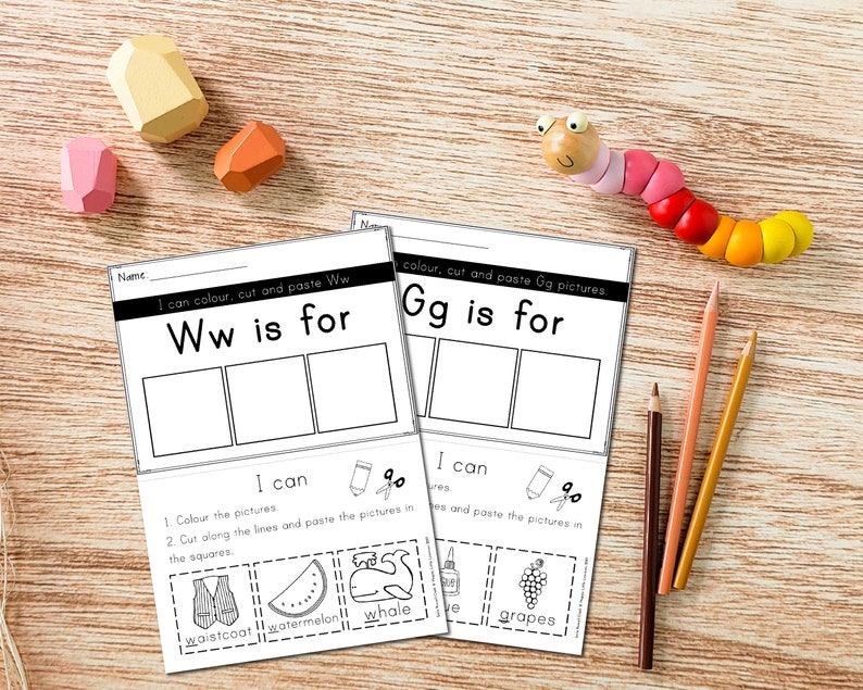 May include: A printable worksheet for kids to learn the letters W and G. The worksheet has two sections, one for each letter. Each section has a title, "Ww is for" and "Gg is for", and three blank squares for pictures. Below the squares, there are instructions for the child to color, cut, and paste pictures in the squares. The worksheet also includes a list of words that start with the letter W and G, such as "waistcoat", "watermelon", "whale", and "grapes".