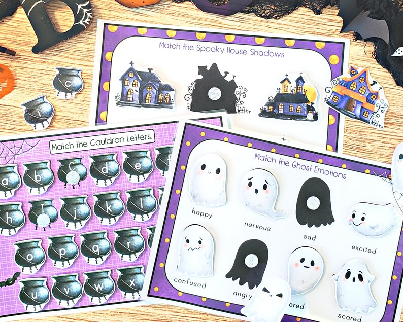 May include: A set of printable Halloween-themed matching games for kids. The games feature spooky houses, cauldrons, and ghosts with different emotions. The games are designed to help children learn letters, match shapes, and identify emotions.
