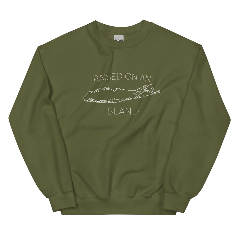 May include: A green sweatshirt with the text "RAISED ON AN ISLAND" and a white outline of Long Island.