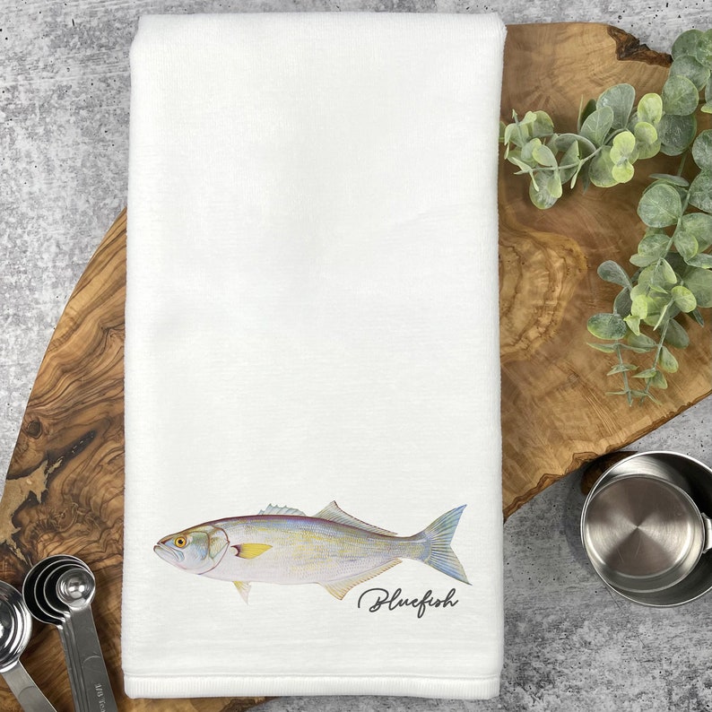 white color hand towel made from 100% Shirred microfiber polyester and reverse to a cotton loop terry fabric, print fish image