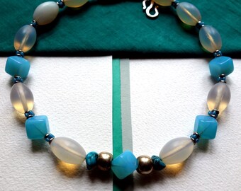 Necklace with opal glass beads