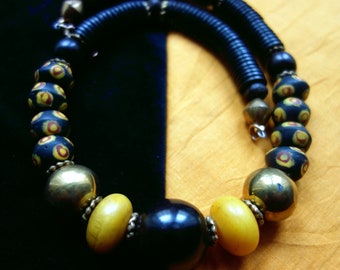 Long necklace with copal beads from Marocco and glass beads from Westafrica