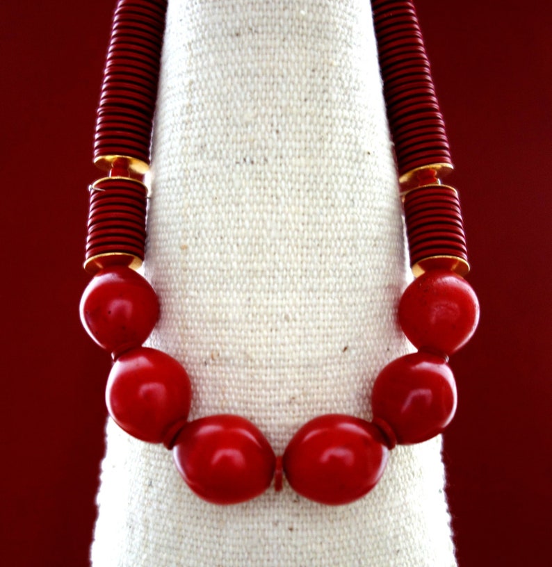 Necklace with old glass beads and bakelite-heishi from westafrica
