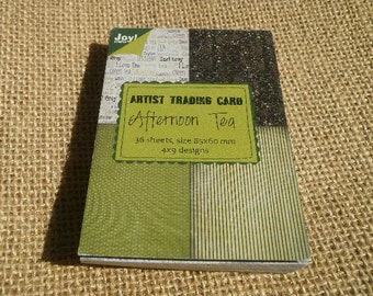 Bloc de papiers décoratifs , dans les tons à dominante vert , 9 dessins , taille 8,5 x 6 cm