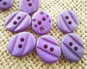 Lot de 10 petits boutons ovales à deux trous en plastique  , coloris violet , taille 16/13 mm