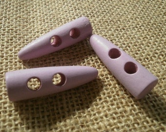 Boutons triangulaires x 3 en bois , coloris mauve , taille 4 x 1,4 cm