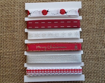 Assortiment de 6 x1 mètre de ruban  , coloris blanc , argenté  et rouge , largeur 10 mm