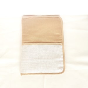 Health book protector to embroider in cross stitch, beige knitted mesh
