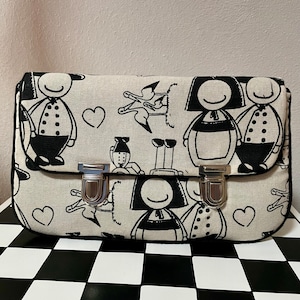 Pochette motifs Alsace fermoirs cartable