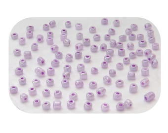 Sachet de 450 (32g) perles de rocailles verre violet clair aspect nacré diamètre 4mm