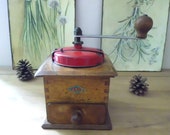 JAPY coffee mill, oak wood body, red enamelled canvas lid, in perfect working condition, Vintage French