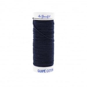 Op de afbeelding: Een spoel donkerblauwe katoenen draad met de tekst "le  Gaufil" en "GUIPÉ COTON" op het etiket.