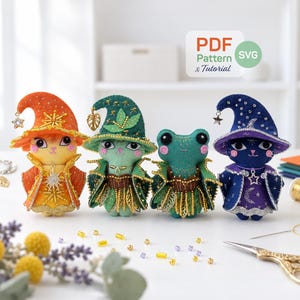 May include: Four small plush dolls featuring an orange cat, a green cat, a green frog, and a dark blue cat, each wearing a pointed wizard hat and a decorative cape. The dolls are adorned with beads and charms. A label reads PDF Pattern & Tutorial.