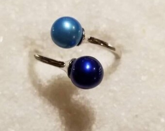 Justerbar ringbeslag i 925 sterlingsilver med dubbel pärla (pärlor ingår ej)