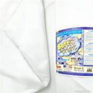 May include: White fabric with a label that says "Soft & Stretchy" and has a cloud with a smiley face on it.