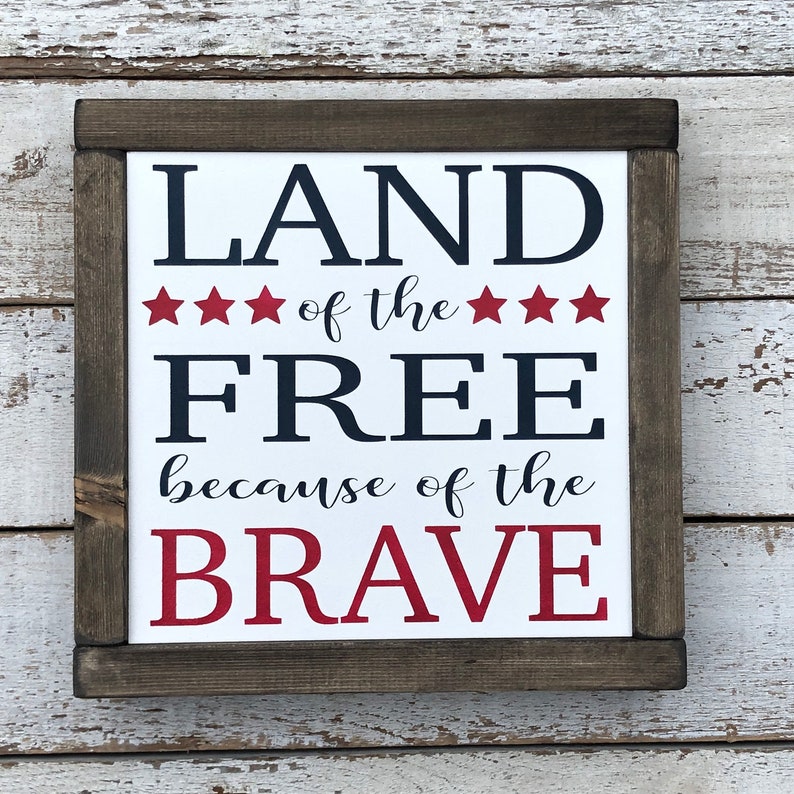 Land of the Free because of the Brave Wood Sign