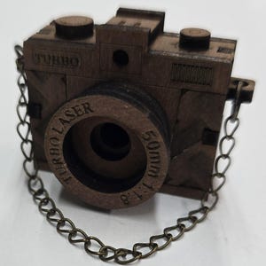 Miniature Wooden Camera — Brown Basketweave Back, Engraved Turbo Camera Ornament, Bronze Chain