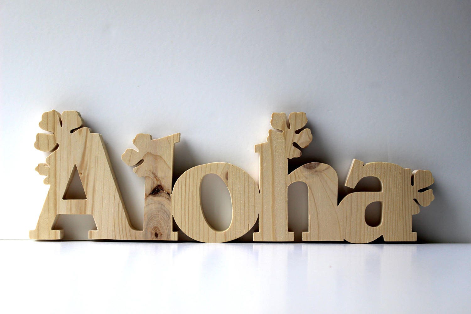 4 images 1 mot 9 lettres sapin guirlande